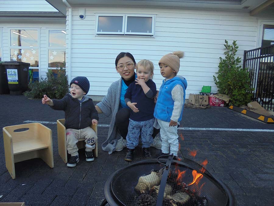 Teacher with childer at Peninsula Kids